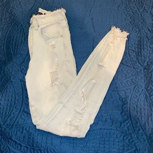 Distressed Light-Wash Skinny Jeans